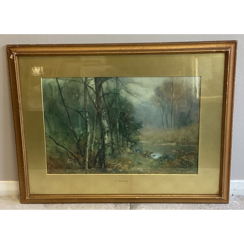 69 - THOMAS TAYLOR IRELAND: (British, 1894 - 1921): A framed and glazed watercolour depicting a woodland ... 