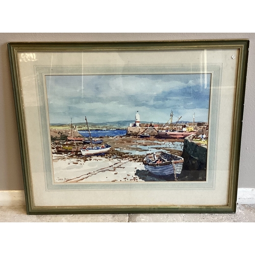 70 - JOSIAH JOHN STURGEON: (British, 1919 - 1999): A framed and glazed watercolour depicting a harbour at... 