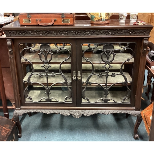 728 - A Victorian mahogany cabinet with scroll decoration. Est. £50 - £80.