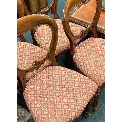 730 - A set of four upholstered dining chairs on fluted supports. Est. £20 - £30.