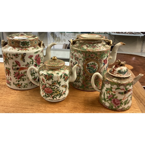 498 - Two large Chinese teapots together with two smaller examples. Est. £20 - £30.