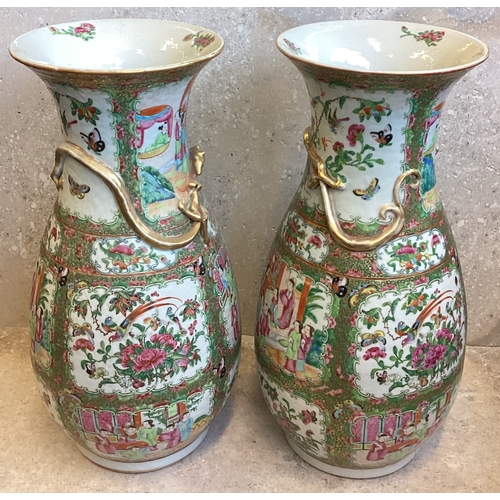 191 - A large pair of decorative Canton vases with gilded decoration. Est. £100 - £150.