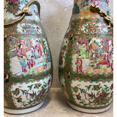 191 - A large pair of decorative Canton vases with gilded decoration. Est. £100 - £150.