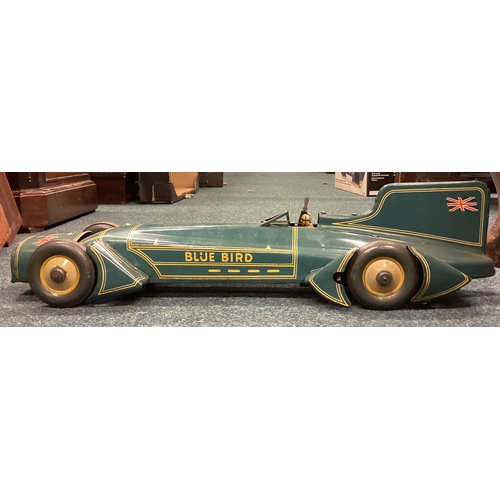 215 - An unusual boxed vintage toy model of a Bluebird land speed car. Est. £250 - £300.