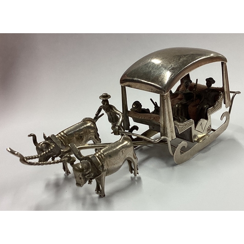 112 - A novelty Antique Continental silver wheelbarrow toy. Approx. 46 grams. Est. £50 - £80.