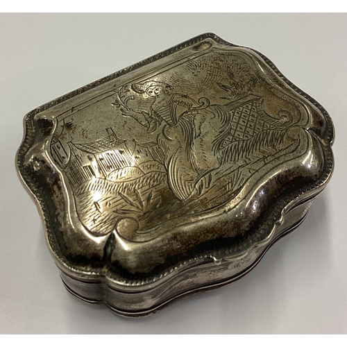 121 - An 18th Century Continental silver snuff box decorated with finely engraved scenes. Approx. 50 grams... 