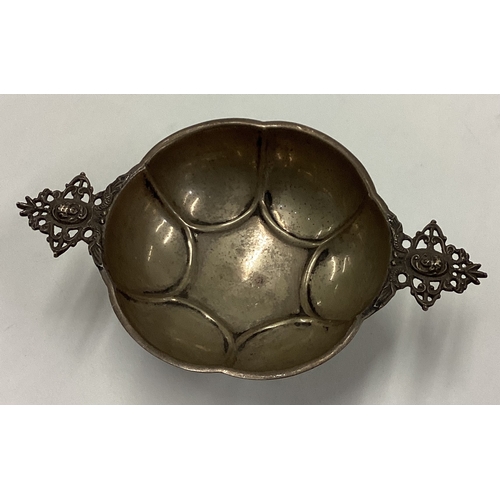 127 - An Antique Dutch silver porringer. Marked to base. Approx. 94 grams. Est. £120 - £150.