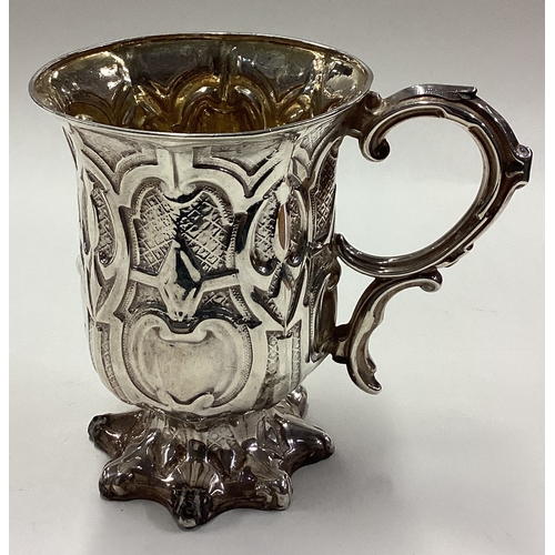 128 - A rare Victorian silver mug of Gothic design. Sheffield 1875. By R&S. Approx. 170 grams. Est. £200 -... 