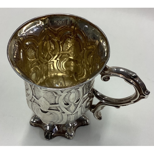 128 - A rare Victorian silver mug of Gothic design. Sheffield 1875. By R&S. Approx. 170 grams. Est. £200 -... 