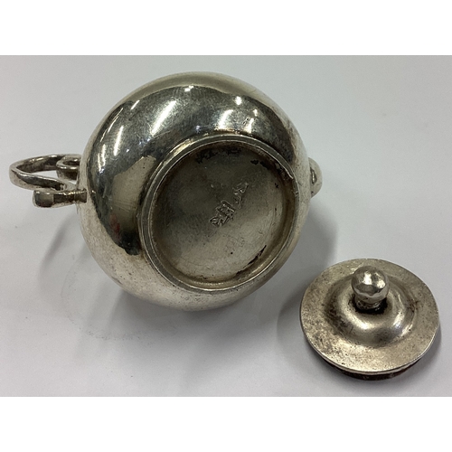 156 - AMSTERDAM: An Antique 18th Century Dutch silver toy teapot. Circa 1720. Approx. 33 grams. Est. £400 ... 