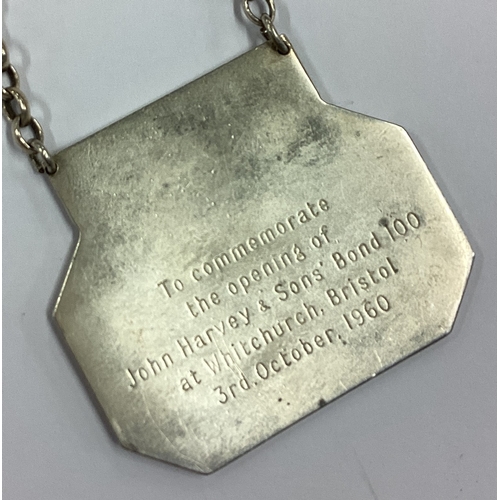 163 - A heavy octagonal silver wine label for 'Sherry'. Approx. 22 grams. Est. £20 - £30.