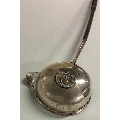 183 - A good Georgian silver toddy ladle with pouring lip and whalebone handle. Approx. 34 grams. Est. £30... 