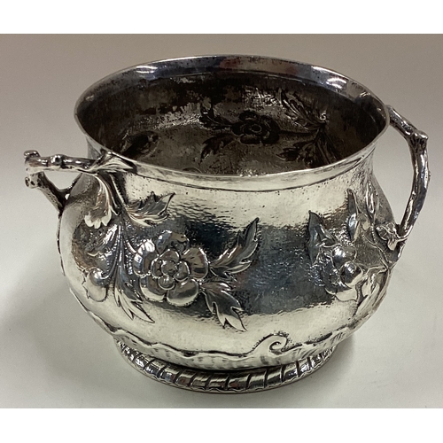 222 - An unusual novelty Art Nouveau Victorian silver two-handled bowl embossed with flowers. London 1900.... 