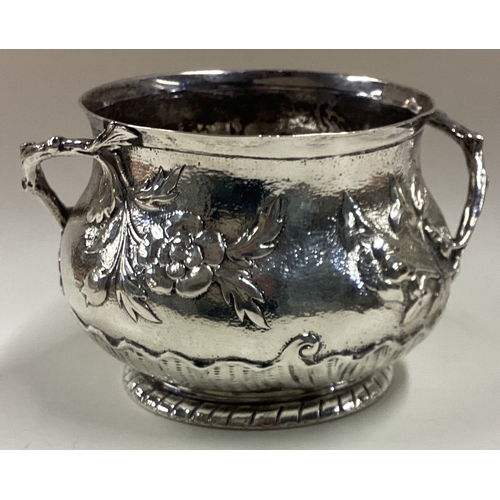 222 - An unusual novelty Art Nouveau Victorian silver two-handled bowl embossed with flowers. London 1900.... 