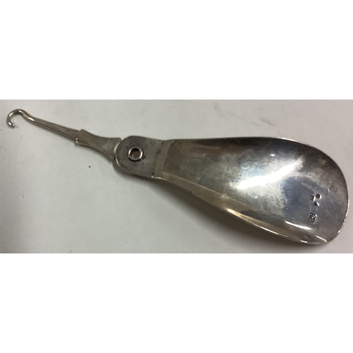 226 - A rare novelty Victorian silver combination shoe horn and hook. Fully marked. 1901. By SJ. Approx. 5... 