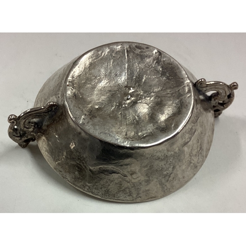 227 - An 18th Century South American Guatemalan Provincial silver quaich. Approx. 54 grams. Est. £40 - £60... 