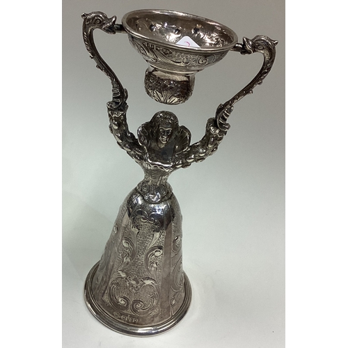 233 - A Victorian silver lady's wager cup of realistic form chased with foliage decoration bearing English... 