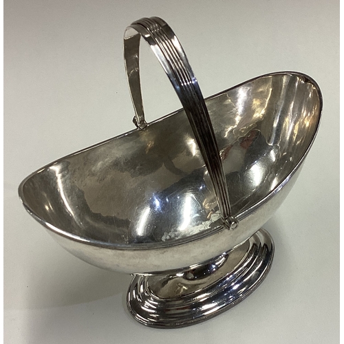 238 - HESTER BATEMAN: A George III silver swing handled basket. London 1787. Approx. 164 grams. Est. £400 ... 