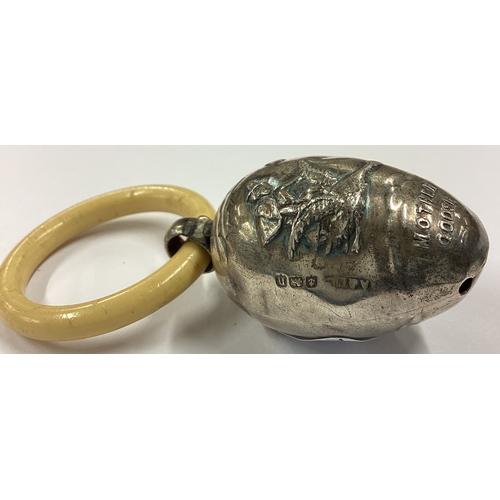 240 - A novelty chased silver babies rattle depicting 'Mother Goose'. Birmingham 1907. Approx. 12 grams. E... 