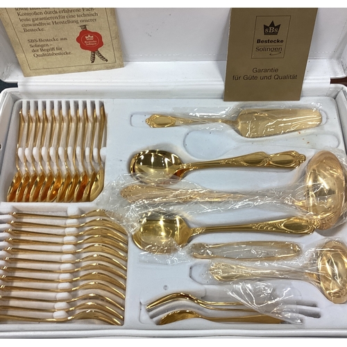 25 - A large gilded cutlery service. Est. £30 - £50.