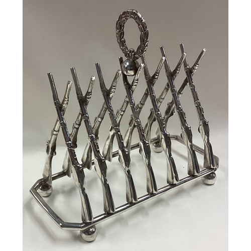 253 - OF SHOOTING INTEREST: A rare and large Victorian silver plated toast rack. Est. £100 - £150.