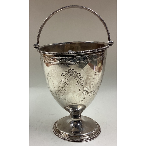 254 - An 18th Century George III silver basket with bright-cut decoration. London 1782. By Benjamin Davenp... 