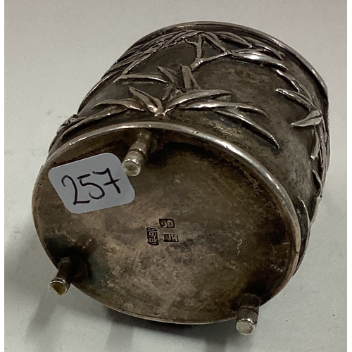 257 - WANG HING: A rare Chinese export silver mustard pot on feet with chased decoration. Marked to base. ... 