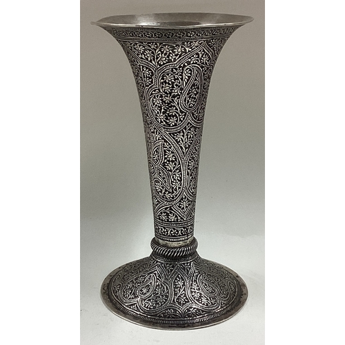 263 - An Antique Kashmiri silver vase. Circa 1900. Approx. 138 grams. Est. £120 - £150.