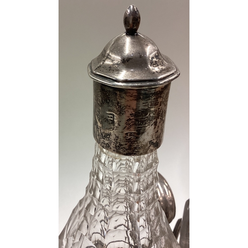 27 - A rare 18th Century silver mounted and glass oil and vinegar set. London 1761. By RP. Approx. 455 gr... 