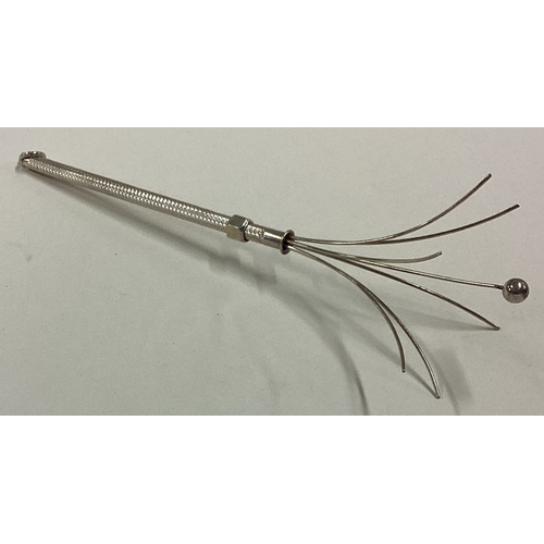 277 - A large Australian Sterling silver swizzle stick with engine turned decoration. Approx. 4 grams. Est... 