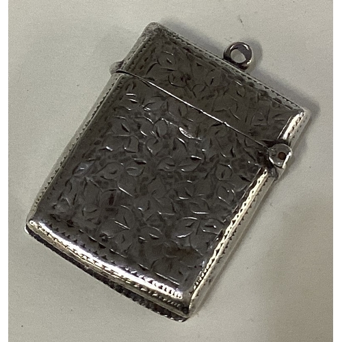 284 - A chased Sterling silver vesta case. Approx. 14 grams. Est. £10 - £20.