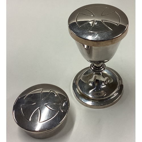 30 - A cased silver communion goblet and box. London 1939. Approx. 140 grams. Est. £100 - £150.