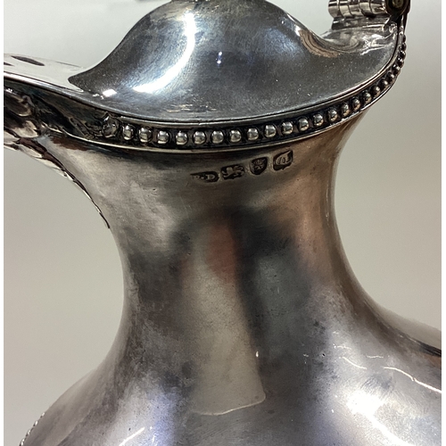 32 - An 18th Century George III silver wine ewer. London 1762. By Benjamin Davenport. Approx. 750 grams. ... 