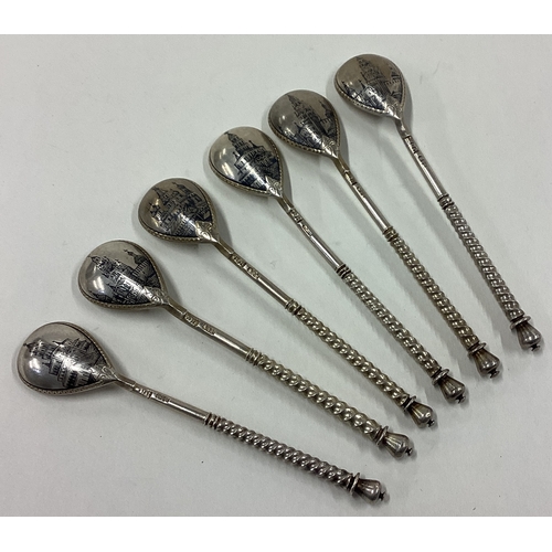 342 - A set of six 19th Century Russian silver and Niello spoons decorated with scenes of temples. Approx.... 