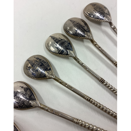 342 - A set of six 19th Century Russian silver and Niello spoons decorated with scenes of temples. Approx.... 