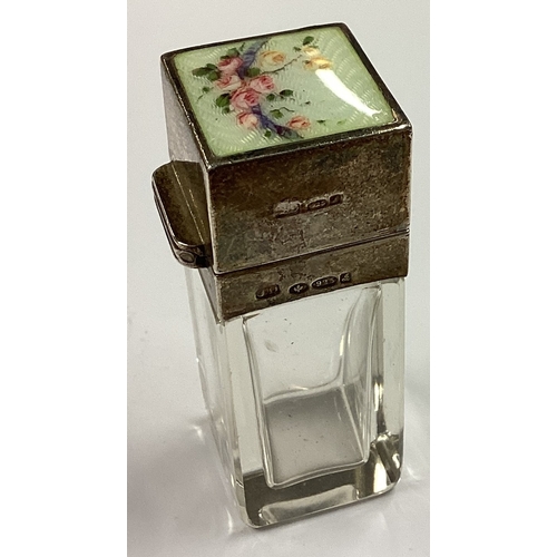 354 - A silver and enamelled scent bottle with floral decoration bearing English import marks. Est. £100 -... 