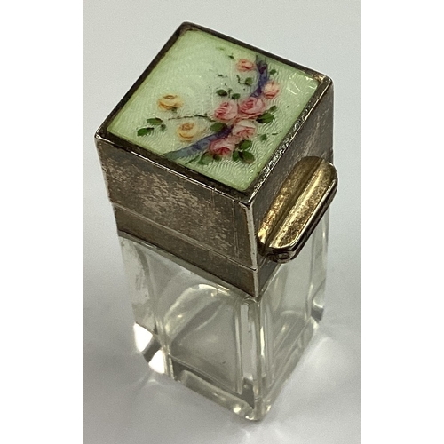 354 - A silver and enamelled scent bottle with floral decoration bearing English import marks. Est. £100 -... 