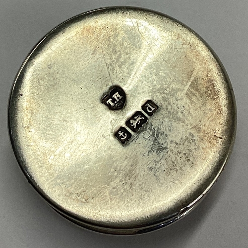 361 - A silver pill box. Marked to base. Birmingham 1903. By TH. Approx. 10 grams. Est. £15 - £20.