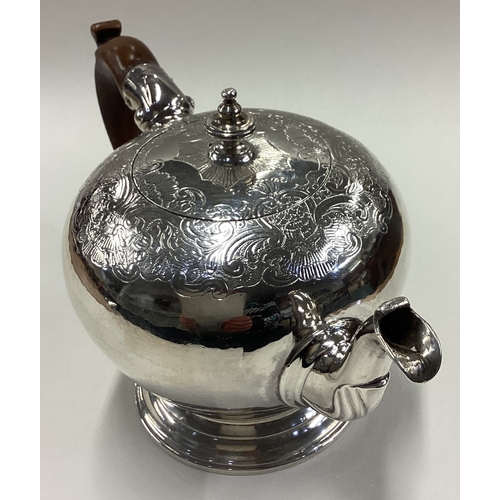 371 - A George II silver bullet-shaped teapot with original chasing to body and cover. London 1743. By Ben... 