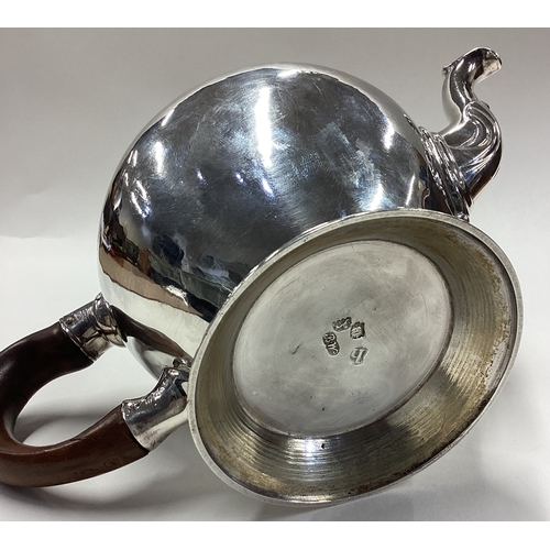 371 - A George II silver bullet-shaped teapot with original chasing to body and cover. London 1743. By Ben... 