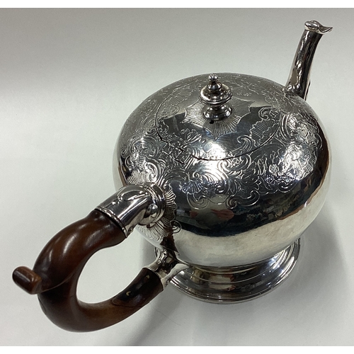 371 - A George II silver bullet-shaped teapot with original chasing to body and cover. London 1743. By Ben... 