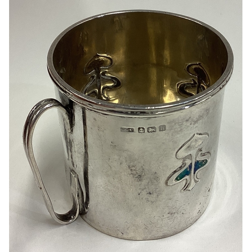 398 - An Arts and Crafts Art Nouveau silver and enamelled mug. Birmingham 1907. By Daniel George Collins. ... 