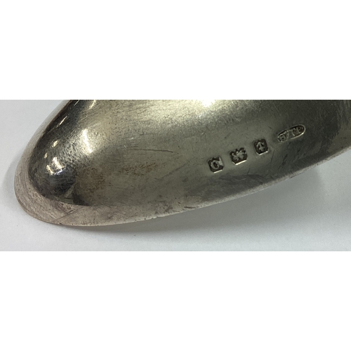 404 - A large silver spoon mounted with a Lincoln Imp. Approx. 54 grams. Est. £40 - £60.