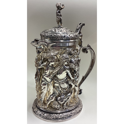 406 - A 19th Century silver plated jug embossed with figures and fruit. Circa 1860. Est. £400 - £600.