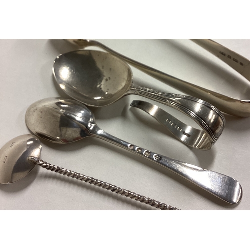 42 - A pair of silver OE pattern sugar tongs together with cruet spoons etc. Approx. 67 grams. Est. £20 -... 