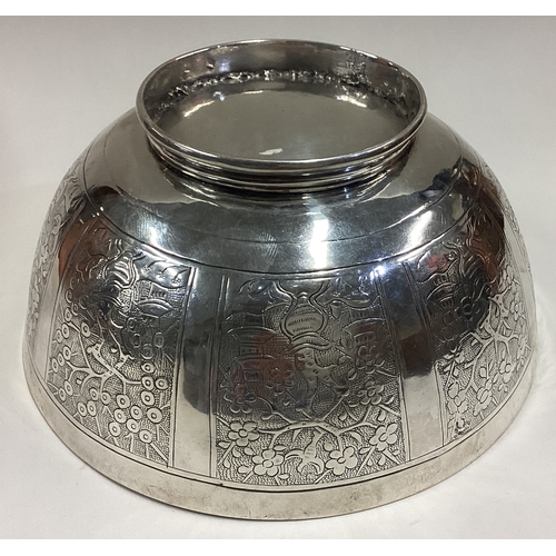 424 - An Antique 19th Century Chinese export silver panelled bowl engraved with trees and foliage. Approx.... 