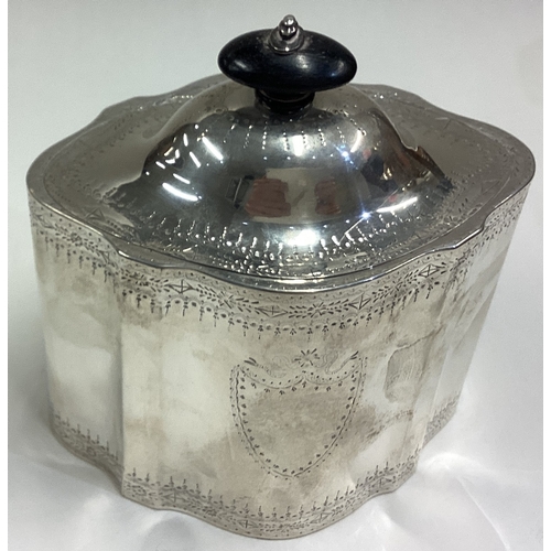 425 - An 18th Century Georgian silver tea caddy with bright-cut swag decoration and blank cartouche. Londo... 