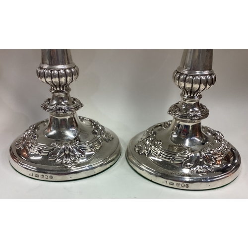 428 - A large pair of 18th Century George III silver candlesticks. Sheffield 1793. By SC Younge & Co. Appr... 