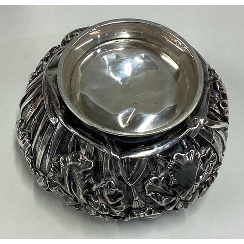 433 - A 19th Century Japanese silver bowl decorated with chrysanthemums. Marked to base. Approx. 259 grams... 