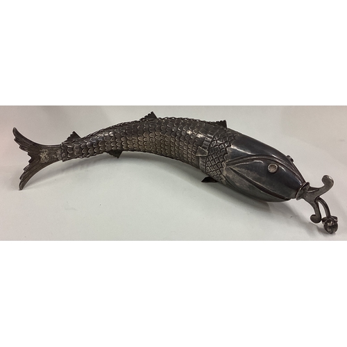 437 - A large and heavy Antique silver articulated figure of a fish. Approx. 238 grams. Est. £400 - £600.